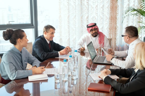 group-delegates-businesspeople-sitting