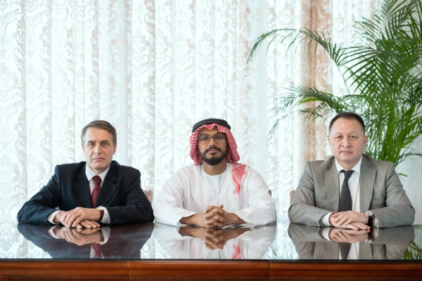 three-successful-foreign-business-partners-delegates-formalwear-sitting-by-table-front-camera-working-meeting-boardroom