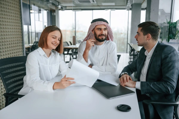 working-with-plan-muslim-businessman-traditional-outfit-with-colleagues-office